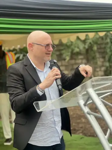 abdeliza-21-speaker-addressing-guests-from-the-podium